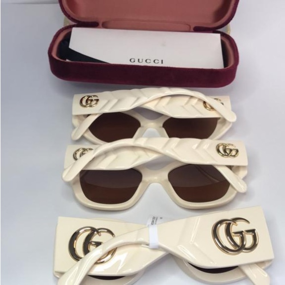 GUCCI GG0809S 002 cat eye sunglass comes in a ivory frame with brown lenses. - Picture 15 of 15